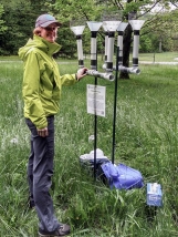 Figure 4: Becky and her ion exchange resin column sample deployment in the Laurel Highlands. 